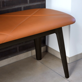 Nordic Bench in dark stained oak with Terra Black leather seat and smooth wood finish.