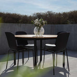 Taupe Patio Chair no. One S1 with black frame, outdoor dining chair with ergonomic design and recycled plastic seat.