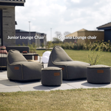 Cobana Junior Lounge Chair og puf i grå olefinfiber med rund form og myk fyll.