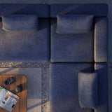 Cobana Lounge Sofa hjørnesofa i svart med modulbasert design og puter i utendørsmiljø.