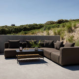 Cobana Lounge Sofa hjørnesofa i svart med modulbasert design og puter i olefintekstil.