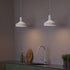 Hvit Dawn Pendant Ø25 lampe i aluminium med perforert topp og hvit innerskjerm.