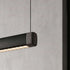 Pebble pendellampe i svart over et spisebord
