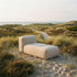 Soft Sofa Outdoor lounger i beige boucle stoff med myk, lav profil og bred sittedel for utebruk.