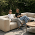 Soft Sofa Outdoor 5-seter hjørnesofa i boucle beige stoff, myk og formstabil for utendørs bruk.