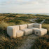 Soft Sofa Outdoor 3-seter sofa med pouf i boucle beige, myk og formstabil for utendørs bruk.