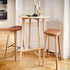Nordic Bar Stool in Terra Black leather with oak wood and steel footrest, 73 cm height.