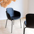 Chair no. One S2 in Terra Black with double shell design and steel frame for indoor dining.