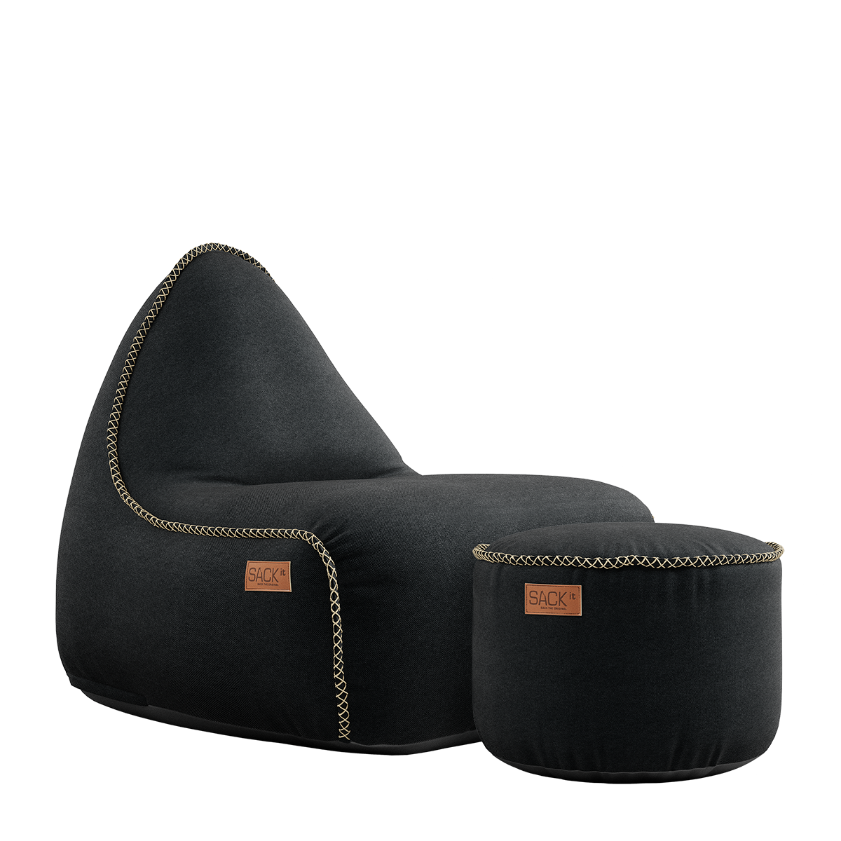 Canvas Lounge Chair og puf i svart lerretstoff med myk, formstøttet design for innendørs bruk.