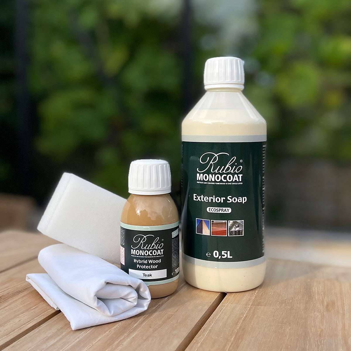 Teak Care Kit with cleaning spray, wood protector oil, sponge, and cloth for outdoor teak furniture maintenance