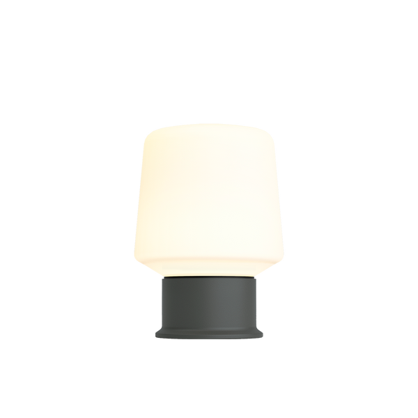 Ambience Lamp Intelligent+ i antrasittgrå, kompakt oppladbar utendørslampe med rund form og justerbar lysstyrke.