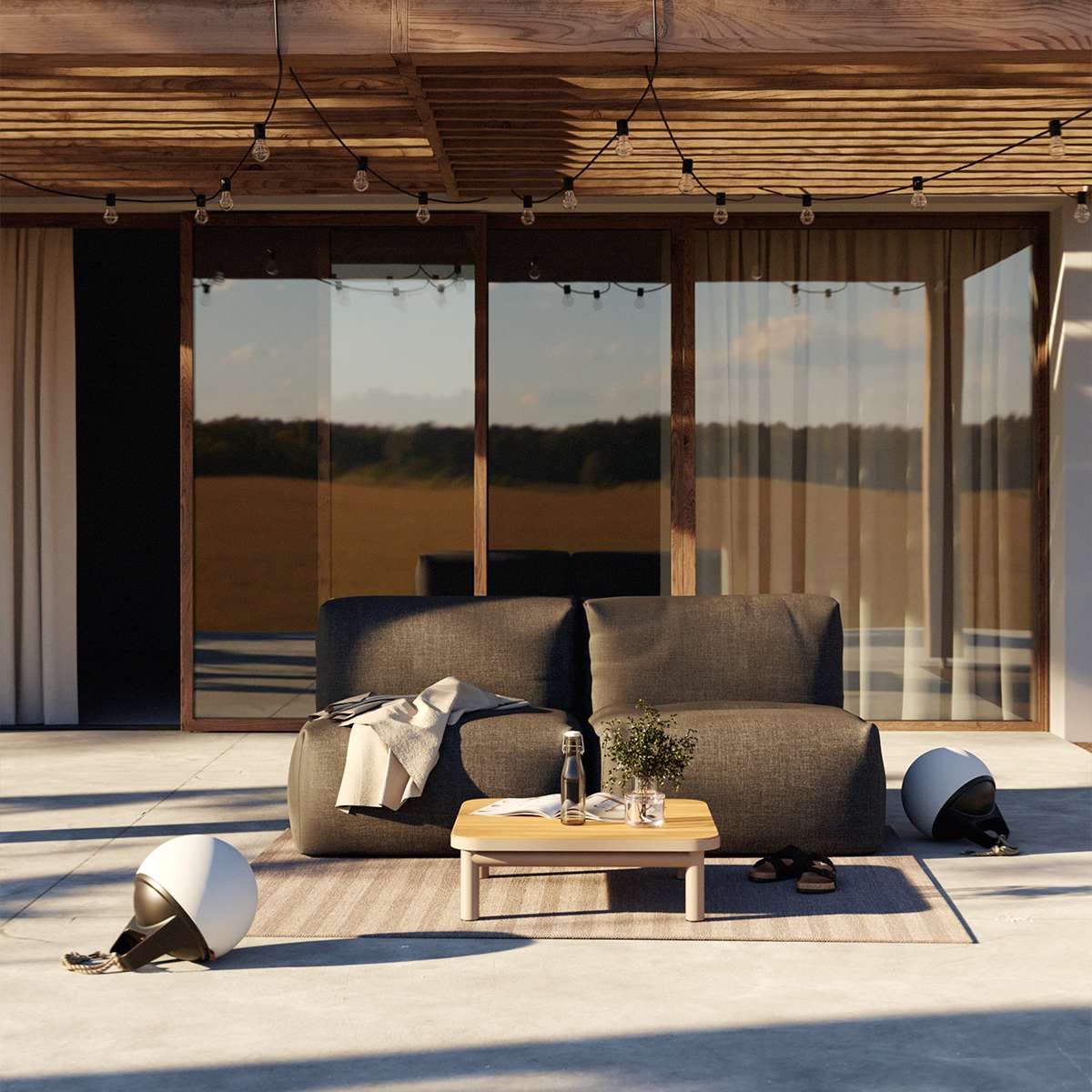 Soft Sofa Outdoor 2-seter i Kirra Noir, myk utendørs sofa med lav rygg og brede puter.
