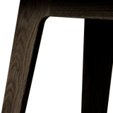 Nordic Bench in dark stained oak with Terra Black leather seat and smooth wooden frame.