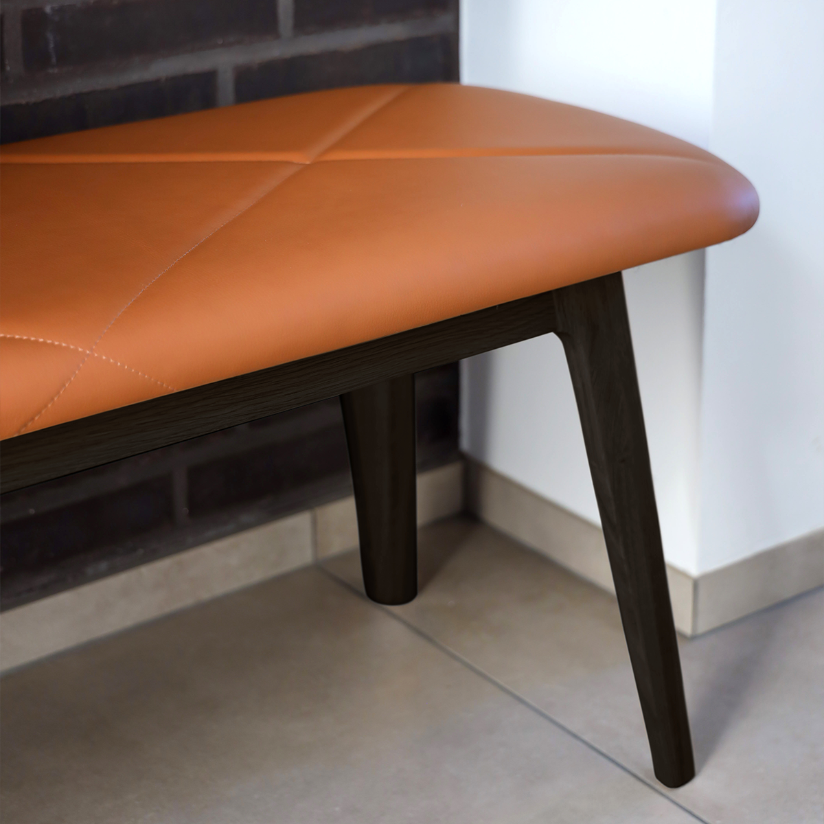 Nordic Bench in dark stained oak with Terra Black leather seat and smooth wood finish.