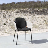 Taupe Patio Chair no. One S2 with black powder-coated steel frame and ergonomic recycled plastic shells.