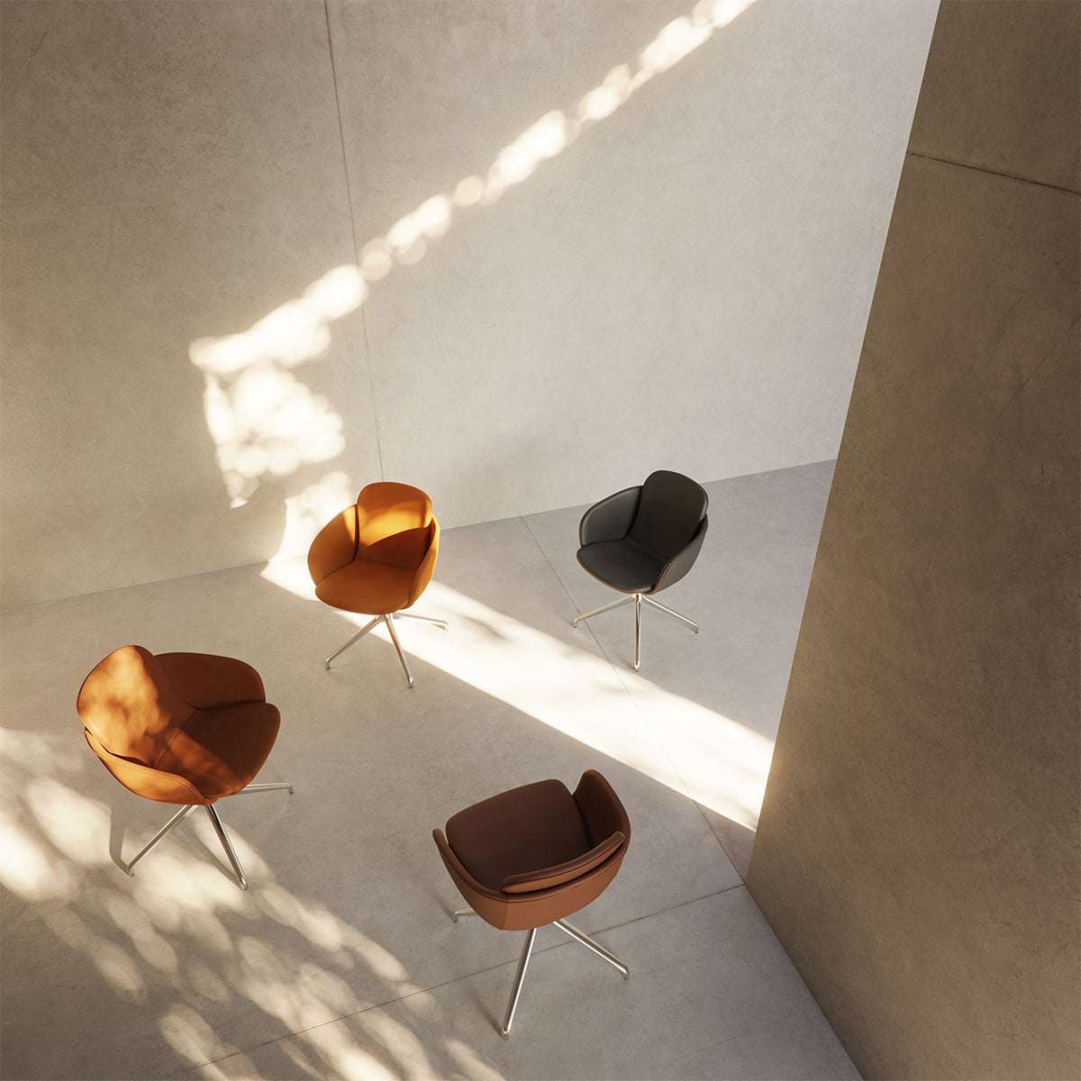 Chair no. One S2 Terra Black with polished aluminum swivel base in a minimalist indoor dining setting.