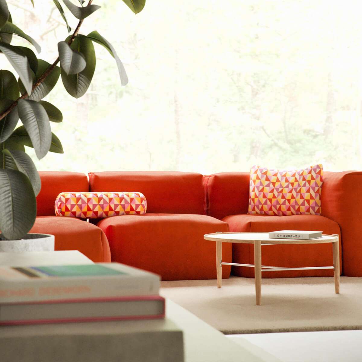 Soft Sofa Indoor lounger in orange jacquard fabric with geometric pattern, soft and flexible design.