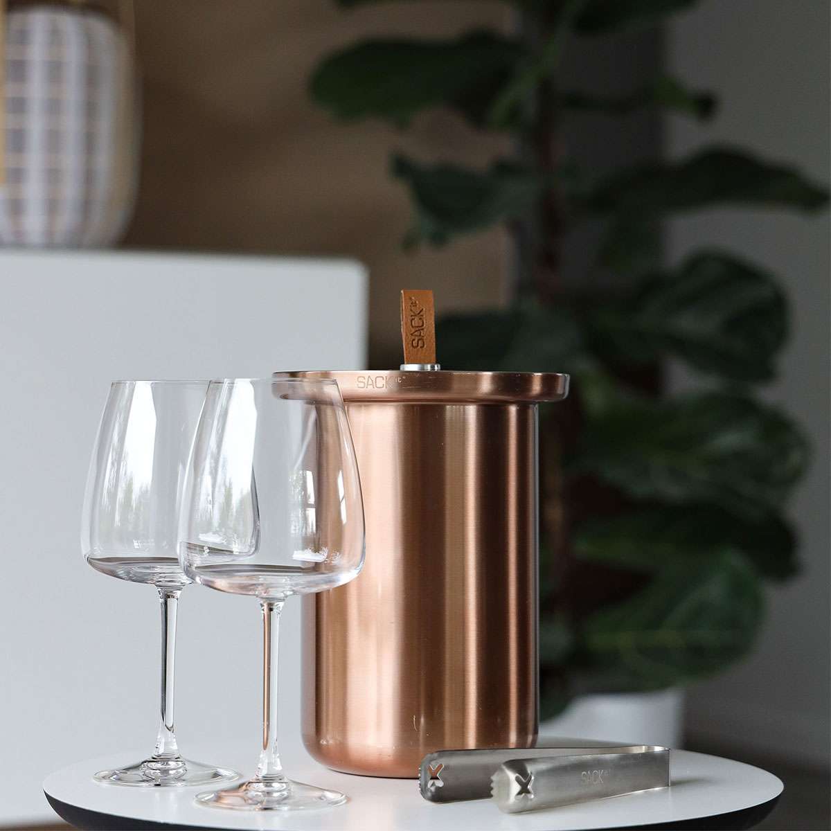 Patio Accessory Stand in black powder-coated stainless steel with a satin-polished stainless steel wine cooler and leather handle.