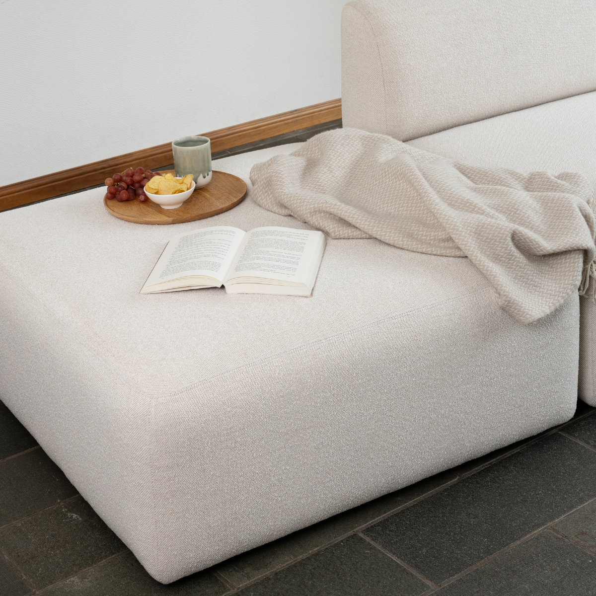 Fjord Sofa pouf with soft rounded edges in a neutral indoor setting.