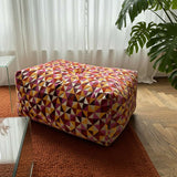 Soft Sofa Indoor pouf in Levanka fabric with soft, rounded shape and neutral tone.