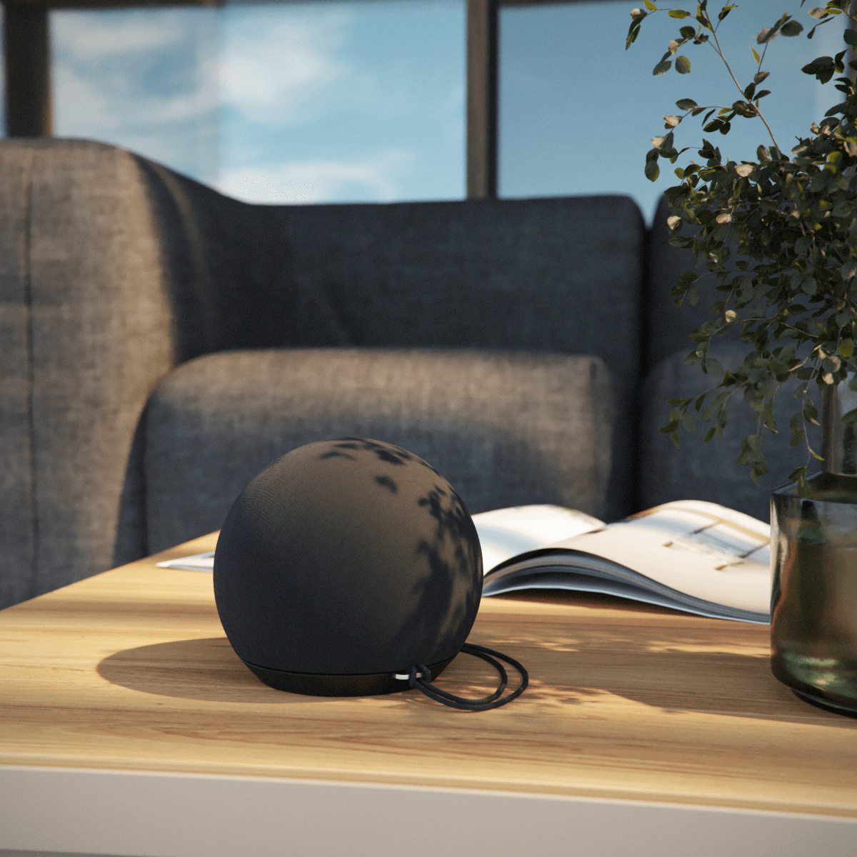 Play Mini høyttaler i kompakt design med slitesterk polyester og ABS-kabinett, svart farge.