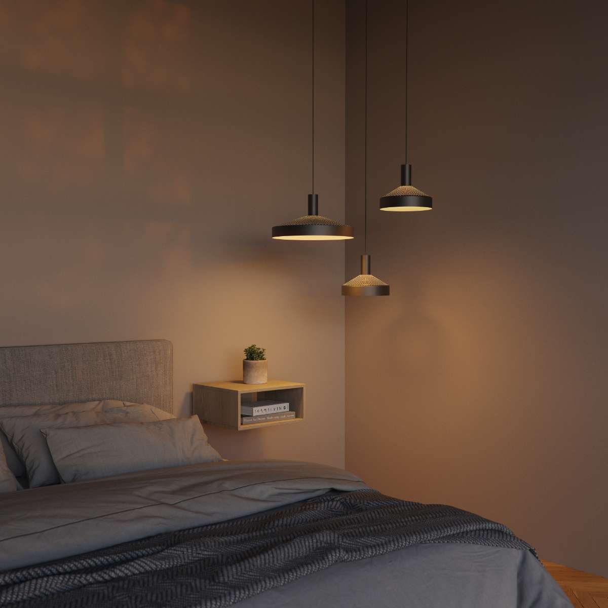 Dawn Pendant Ø40 i svart aluminium med perforert topp og hvit innerskjerm, hengende innendørs.