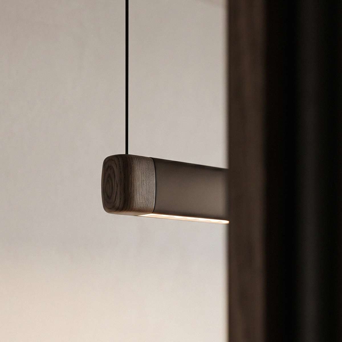 Pebble pendellampe i bronse over et spisebord