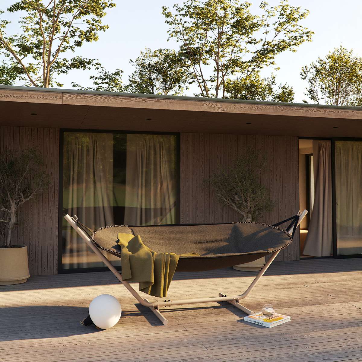 Cobana Hammock hengekøye i grå olefin med taupe pulverlakkert aluminiumstativ utendørs.