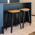 Nordic Bar Stool in black stained oak with Terra Black leather and dark stitches, 73 cm high.