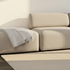 Fjord Sofa pouf i myk beige tekstil med avrundede kanter og skandinavisk design.