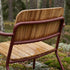 Kirra Patio Lounge Chair i chestnut farge med pulverlakkert aluminium og ubehandlet teaktre, utendørs bruk.