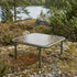 Mollis Coffee Table i olivengrønn med pulverlakkert aluminiumsramme og røykfarget herdet glass.