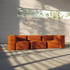 Soft Sofa Indoor hjørnesofa i oransje Jaquard-stoff med myk, modulær design.