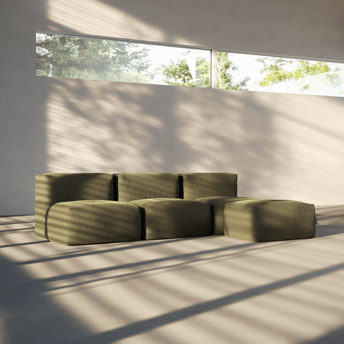 Soft Sofa Indoor pouf i olivengrønn corduroy med brede ribber og myk form.