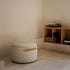 SACKit Pouf Indoor i Teddy Beige stoff med rund, kompakt form og myk fylling.
