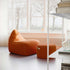 SACKit Chair & Pouf Indoor i oransje jaquard tekstil, myk og moderne loungestol med puf.