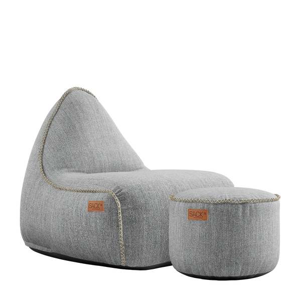 Cobana Lounge Chair og Pouf i sand melange farge med mykt, miljøsertifisert tekstil og rund form.