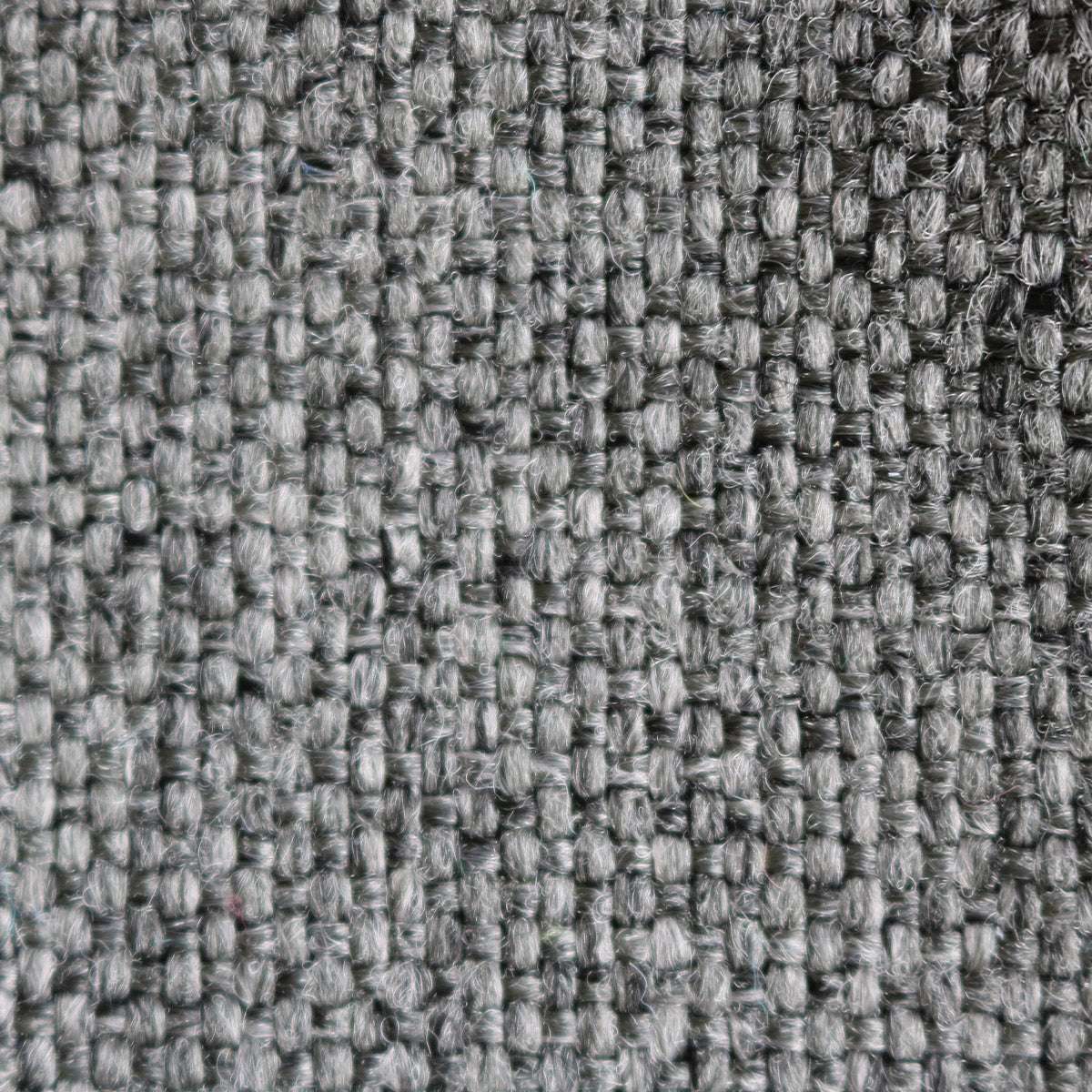 Cobana Lounge Chair og Pouf i lys grå olefinfiber med rund puf og ryggstøtte.